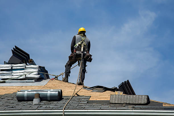 Professional Roofing technician working in Spring Glen, NY